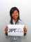 JPT Toursの看板を持ったガイドがお待ちしています